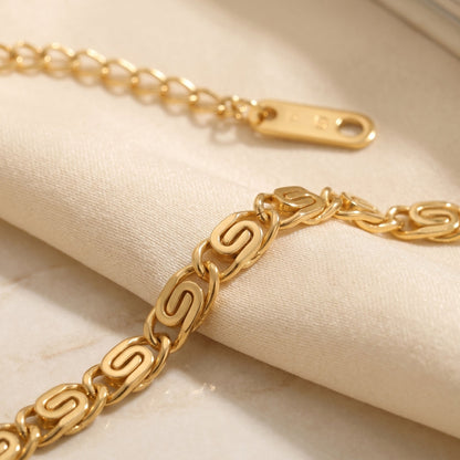 Gold Swirl Link Chain Bracelet